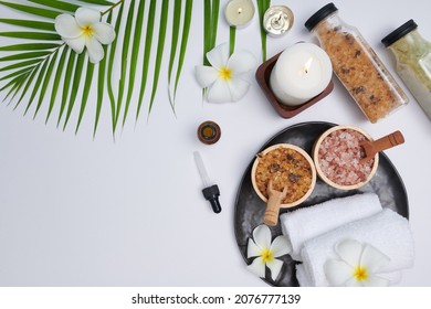 Spa Concept. Beauty And Fashion Concept With Spa Set. Perfumed Flowers Water. Relaxation And Zen, Spa Setting Flat Lay With Bowl, Bath Salt And Flowers, Towel And Natural Soap. Top View.