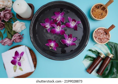 Spa Concept. Beauty And Fashion Concept With Spa Set. Perfumed Flowers Water. Relaxation And Zen, Spa Setting Flat Lay With Bowl, Bath Salt And Flowers, Towel And Natural Soap. Top View.