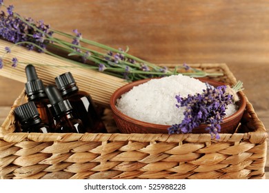 Spa concept. Lavender, aroma oil and sea salt in wicker basket, closeup - Powered by Shutterstock