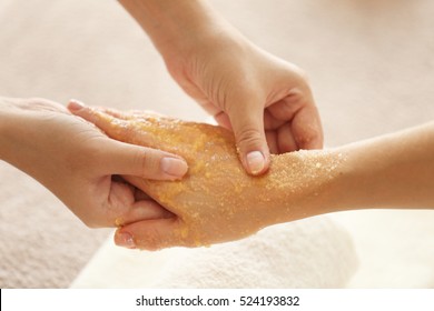 Spa Concept. Specialist Massaging Female Hand With Scrub