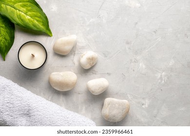 Spa still life with water lily and zen stone in a serenity pool