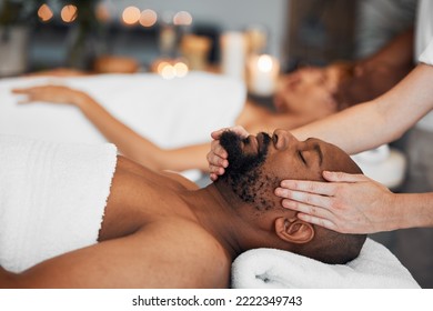 Spa, Couple And Massage For Health And Wellness At Luxury Resort For Peace, Calm And Quiet Time With Hands Of Therapist In A Beauty Salon. Black Man Lying On Bed For Body, Mind And Head Care At Hotel