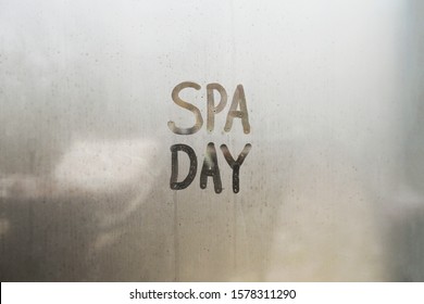 Spa Day Message On Steamy Glass Window