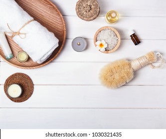 Spa essentials on the white background, top view - Powered by Shutterstock