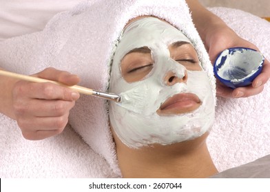 Spa Esthetician Applying Organic Facial Masque