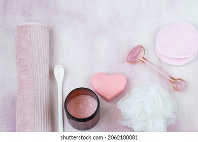 Spa Items On The Table: Towel, Massager, Soap, Washcloth