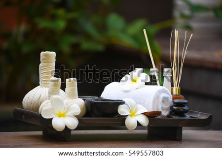 Spa massage compress balls, herbal ball on the wooden with treaments spa , Thailand, soft and select focus