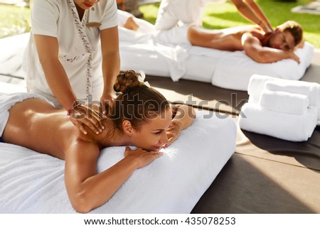 Spa Massage For Couple Beautiful Healthy Happy People Enjoying Back Massage At Beauty Salon Outdoors Spa Massage For Couple Beautiful Healthy Happy People Enjoying Back Massage At Beauty Salon Outdoors