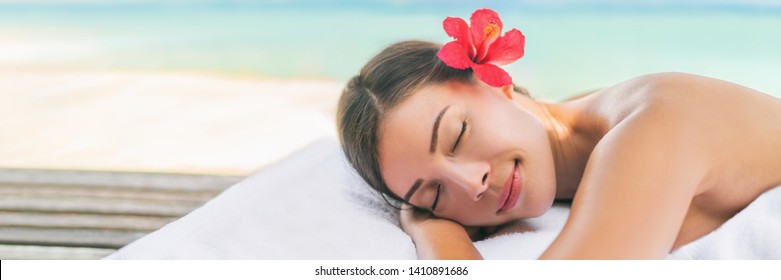 Spa Massage Therapy Woman Lying On Massage Table For Full Body Scrub Or Deep Tissue Swedish Luxury Treatment. Banner Panoramic Background.