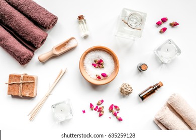 Spa Set With Towels And Soap On White Background Top View