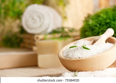 Spa setting with bath salt and towel. - Powered by Shutterstock