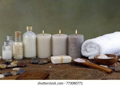 Spa setting with row of towel ,rolled towel on mat
 - Shutterstock ID 773080771