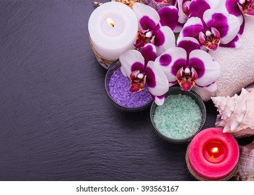 spa setting  therapy with flowers isolated on a white wooden background.Selective focus