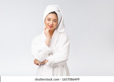 Spa Skincare Beauty Asian Woman Drying Hair With Towel On Head After Shower Treatment. Beautiful Multiracial Young Girl Touching Soft Skin