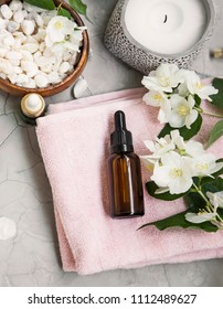 Spa Still Life With Jasmin Oil, Flowers , Bath Salt And Towels. Wellness And Spa Flatlay Setting