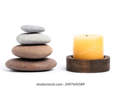 Spa stones with candle isolated on white background. Zen concept - Powered by Shutterstock