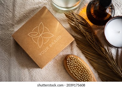 Spa Table Setting With Organic Product Paper Box Aerial View