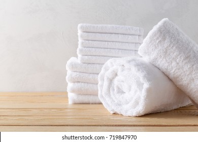 Spa Towels On Wooden Surface