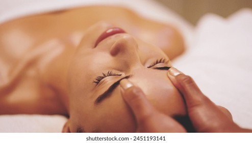 Spa, treatment and head massage for female client, scalp and health for stress relief. Skincare, beauty and luxury cosmetology for facial in salon, zen and relax for body care and beautician wellness - Powered by Shutterstock