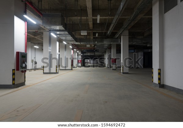 Space background of large indoor underground\
parking passage