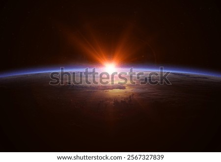 Space. Beautiful blue planet Earth in outer space on background of stars. Sunrise view of the planet Earth from space. View from orbit. Elements of this image furnished by NASA