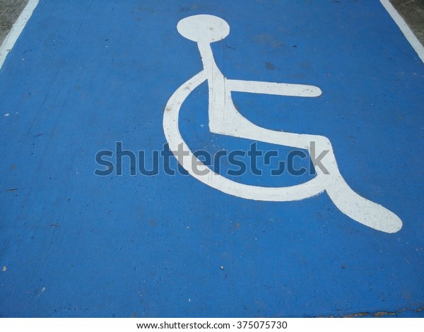 the space for Disabled\
parking sign