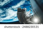 Space Engineer Servicing Panel on a Communication Satellite with an Automatic Screw Gun. Brave Astronaut Working in Outer Space with Beautiful Blue Planet Earth in the Background