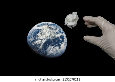 Space Junk Above Earth, And Hands In White Gloves. Space Trash Concept.Space Debris.pollution Of The Atmosphere.Cosmic Garbage.abandoned Artificial Satellite.orbit Dangerous.