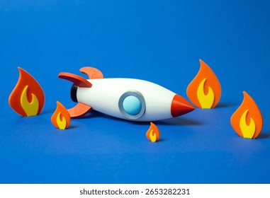 Space rocket crashed and on fire. Business failure, failed startup. Downfall of ambitious plans, flawed execution, or crisis outcomes. Volatility of startups, financial risks, or unexpected setbacks.