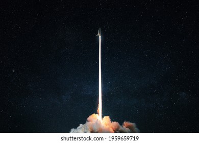 Space rocket launch into the starry sky. Space shuttle with blast and blast lift off into space on a dark background. Successful start, concept - Powered by Shutterstock