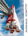 space rocket on the launch pad on a background of blue sky