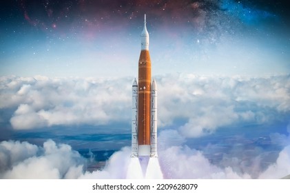 Space rocket take off from Earth. Spacecraft in sky. Mission on Moon of Orion spacecraft. Spaceship take off. Artemis space program. Elements of this image furnished by NASA