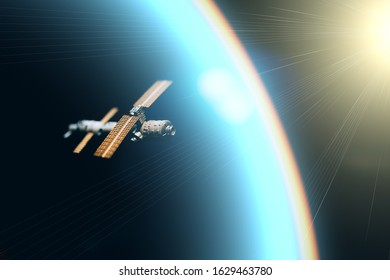 Space Satellite Orbiting The Blue Planet. Decorations For Photo Sattelite. Selected Focus