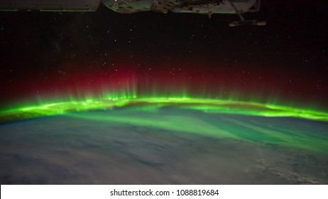 Space satellite orbiting the earth with back ground of star trail on burst motion. Elements of this Images courtesy of NASA Johnson Space Center. - Powered by Shutterstock