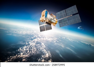 Space satellite orbiting the earth. Elements of this image furnished by NASA. - Shutterstock ID 258972995