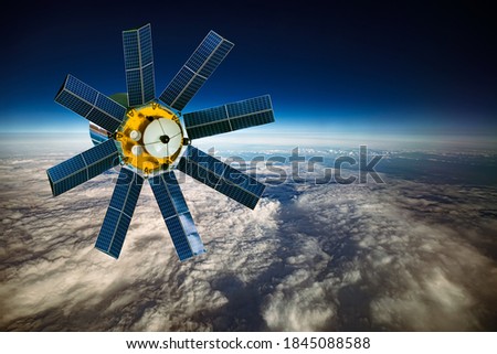 Space satellite orbiting the earth. Elements of this image furnished by NASA.