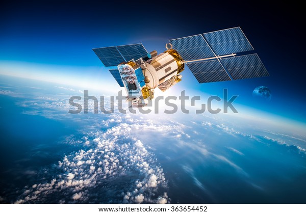 Space satellite orbiting the earth. Elements of\
this image furnished by\
NASA.