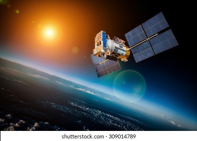 Space satellite orbiting the earth on a background star sun. Elements of this image furnished by NASA. - Shutterstock ID 309014789