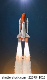 Space shuttle flight in outer space. Launch of rocket with astronauts. Mission of spaceship. Elements of this image furnished by NASA