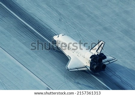The space shuttle is landing. Elements of this image furnished by NASA. High quality photo