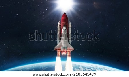 Space shuttle launch in outer space from Earth. Rocket on orbit of the planet. Elements of this image furnished by NASA