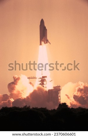 Space shuttle lifting up from Cape Canaveral