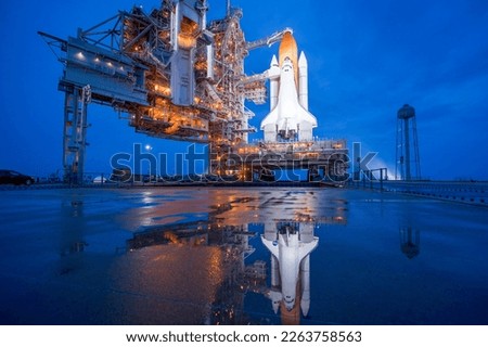 The space shuttle at night after the rain (Photo courtesy of NASA)