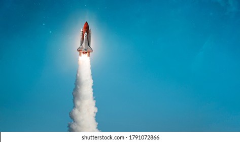 Space shuttle on blue sky background. Gradient. Space art wallpaper. Elements of this image furnished by NASA - Powered by Shutterstock