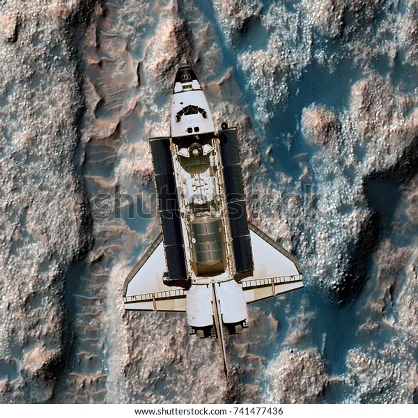 Space Shuttle orbiting alien\
planet (extrasolar planet). Elements of this image furnished by\
NASA.\
