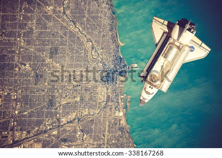 Space Shuttle orbiting the earth. Elements of this image furnished by NASA.vintage color