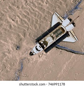 Space Shuttle orbiting Mars. Elements of this image furnished by NASA.