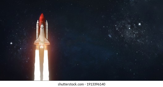 Space shuttle in outer space on dark background. Rocket with astronauts. Elements of this image furnished by NASA - Shutterstock ID 1913396140