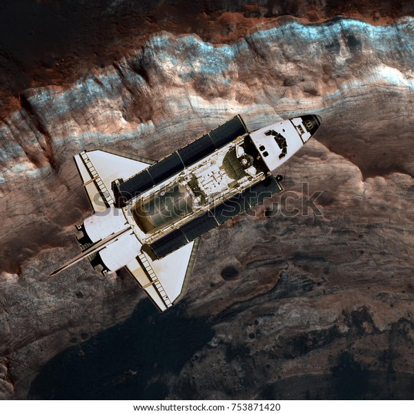 Space shuttle over Mars surface,
Mars planet. Elements of this image furnished by
NASA.
