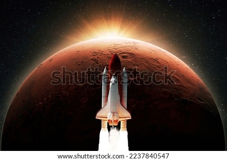 Space shuttle rocket with blast takes off to the red planet mars with dawn rays light. Successful launch of the spacecraft. Space mission to mars, creative